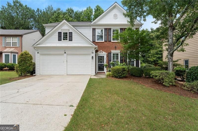 Welcome to 475 Chippenham Court, tucked away on a quiet cul-de-sac in the highly sought-after Wellington neighborhood! This incredibly well-maintained home offers nearly 2,000 square feet of thoughtfully updated living space, plus access to top-rated schools and exceptional community amenities. The bright, open layout features vaulted ceilings, a flowing floor plan, and a lengthy list of upgrades - including fresh interior paint, updated lighting, and commercial-grade toilets. Hardwood floors span the formal dining room, sitting area, and entire second floor, while the great room offers a cozy, carpeted retreat centered around an elegant gas fireplace. The kitchen includes tile flooring, new cabinet doors, and newer appliances: oven and dishwasher (2023), and refrigerator (2018). Step outside to enjoy a private back patio oasis, classic brick-front curb appeal, and an attached 2-car garage - all within a friendly, amenity-rich community. Residents enjoy access to a clubhouse, junior Olympic pool with splash pad, tennis courts, basketball court, and playground. A scenic walking trail leads directly to Findley Oaks Elementary, with zoning for Taylor Road Middle and Chattahoochee High School. Located minutes from GA-400, Hwy 141, Halcyon, Avalon, and Downtown Alpharetta - this home combines comfort, convenience, and charm in one unbeatable location.