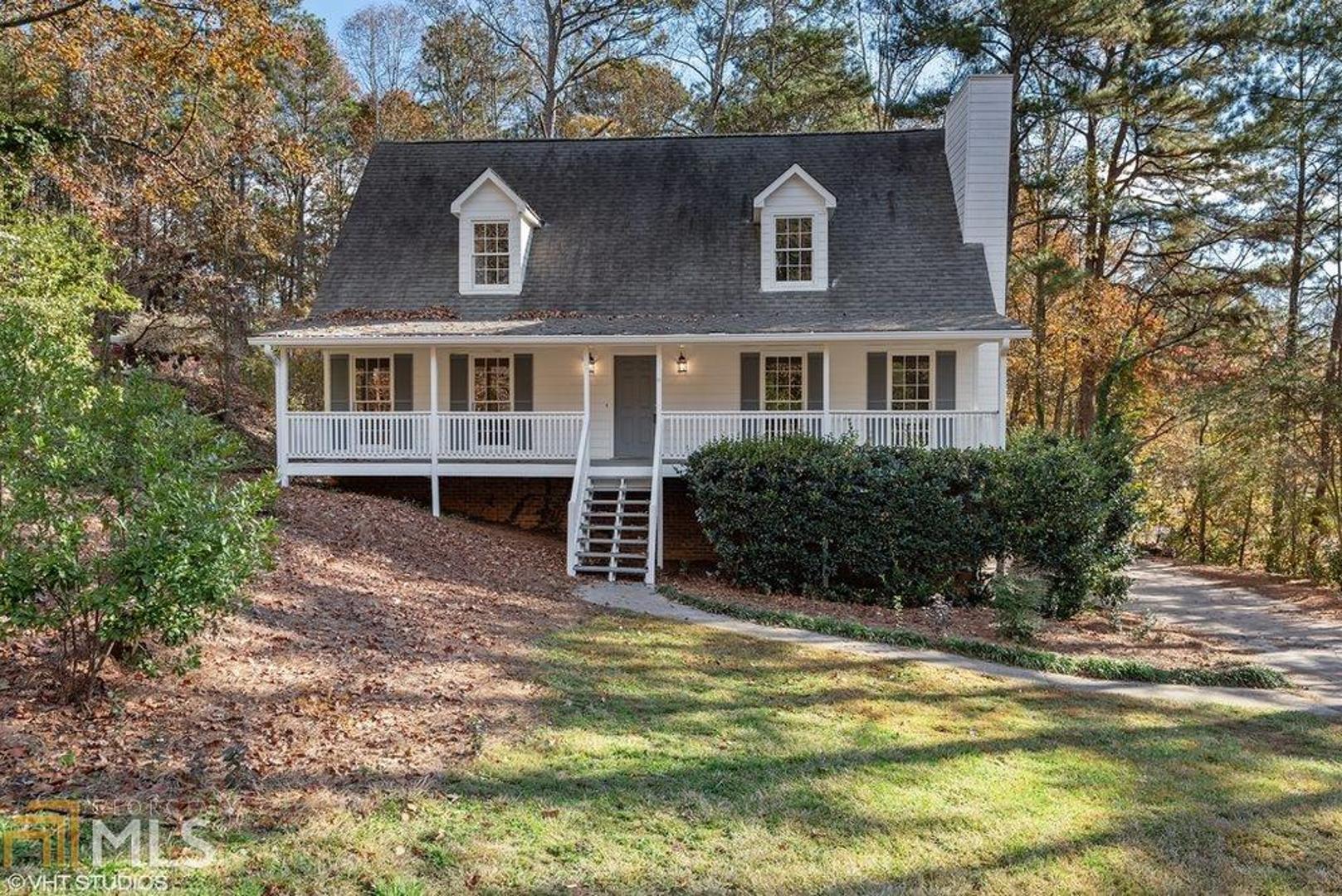 This fully renovated, cape code style home features a deep rocking chair front porch that runs the full length of the home. It is freshly painted inside & out w/ new concrete siding, gutters & downspouts. The great room feat a FP w/ a lovely mantle & surround. The kitchen has an abundance of white cabinetry, plenty of granite countertops, a pantry & a pristine backsplash. The bathrooms are renovated w/beautiful tile surrounds in the showers. This home is pristine & move-in ready!