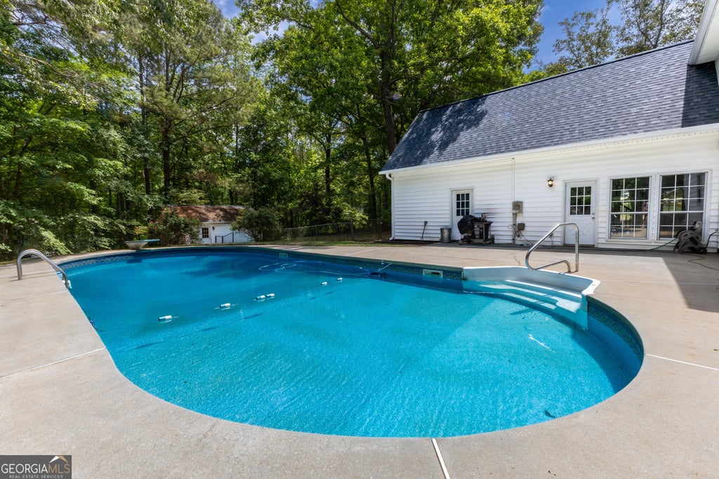 Photo of 115 Saint Andrews Walk, Sharpsburg, GA 30277 (MLS # 10814526)