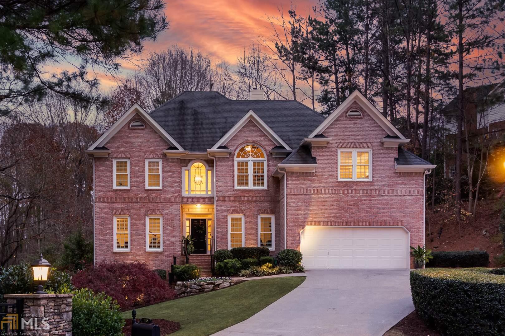 Don’t miss out on this home with an amazing backyard oasis that you will fall in love with! The backyard is fully terraced and designed with hardscaping and landscaping that highlights the best of each season. Enjoy your summers relaxing in the salt-water, infinity pool. The interior features hardwoods and newly installed carpeting throughout the main and upper levels and new LVT wood flooring on the terrace level. The kitchen features cherry cabinets, granite countertops and stainless steel appliances and is set in the center of the main level. You can look out over the backyard or entertain your guests in the open floor plan. So much natural light with windows all along the back side. The main level offers a formal dining room, guest bedroom, an office/library, full bathroom, and family room. The upper level is complete with spacious bedrooms, laundry room, and a large master suite that has its own fireplace and sitting area. The remodeled master bath has a large shower with a rain-shower head and a separate handle sprayer fixture, separate his/her vanities and a whirlpool bath. Entertain guests or have family movie nights in the media room (built-in speakers) on the finished terrace level that walks out to the pool and backyard. A guest bedroom, a full bath, playroom/sitting area and extra storage are included on this level. There are so many options to spread out if you are working from home or learning virtually as each level has a bedroom that can also function as an office. The home is located on a quiet cul-de-sac and is within walking distance to parks, shopping, and dining.
