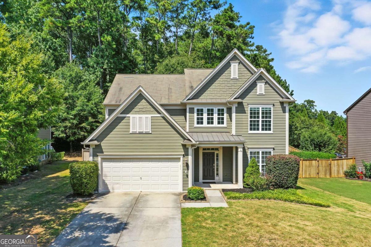 Welcome to this beautiful home in the highly sought-after Harmony on the Lakes community! This hard-to-find 5-bedroom home under $500,000 offers a fantastic floor plan with a bedroom and full bath on the main level. The main level also features a formal dining room, an eat-in kitchen with granite countertops, stained wood cabinetry, stainless steel appliances, and updated light fixtures throughout. Upstairs, one of the spacious secondary bedrooms is large enough to serve as a bonus room or recreation room, while the primary suite features a roomy bath and ample closet space. The exterior offers a level driveway, a flat backyard with a patio perfect for grilling and entertaining, and mature landscaping. Enjoy resort-style living with Harmony on the Lakes' outstanding amenities: a lake with a fishing dock, swim team, tennis, pickleball, playgrounds, walking trails, and a full exercise facility. Conveniently located near schools, parks, and shopping, this home is priced to sell and won't last long!