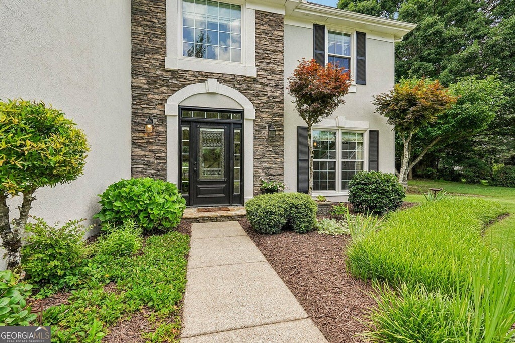 Photo of 162 St Martin Drive, Suwanee, GA 30024 (MLS # 10843488)
