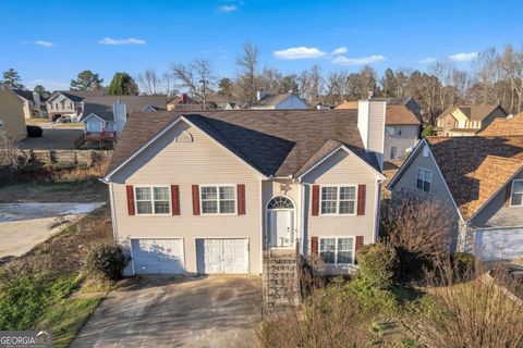 Photo of 8039 Mustang Lane, Riverdale, GA 30274 (MLS # 10701674)