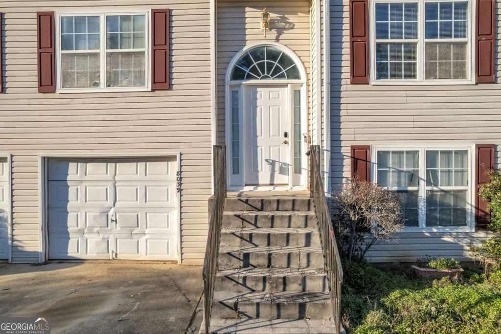 Photo of 8039 Mustang Lane, Riverdale, GA 30274 (MLS # 10701674)