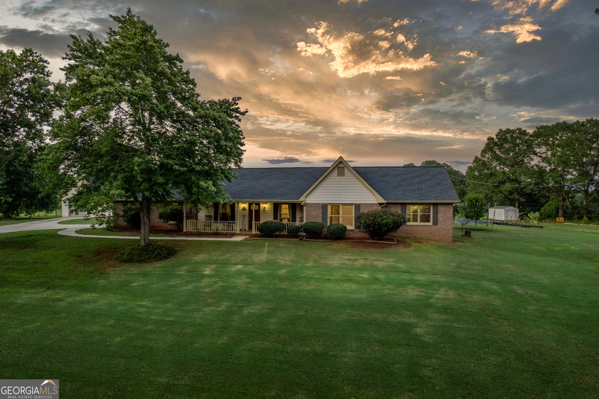 Come enjoy the charm and serenity of this 4 sided brick ranch nestled on a 3.03 acre parcel in covington's most sought after location. This property is the perfect blend of country tranquility and convenient access to town and amenities. The over 3 acre lot is perfectly designed featuring an inground pool for those hot summer days, Covered boat and RV storage, a garden area ready for your green thumb, an additional garage and workspace for all your hobbies, and plenty of entertainment with the cows in the back pasture (additional acreage could be available). And your animal friends will love this place!!! A dog kennel off the back of the workshop and the chicken coop are just a few places they can call home. Inside you will find and oversized family room/ great room that will hold all of your large furniture, expansive kitchen with abundant cabinet space right off the family room. A sunroom for morning coffee and a good book. 5 bedrooms (a large addition was added so the tax assessors square footage is not correct) that can be used for other things such as an office, workout room, or home theater. The possibilities are endless. It is rare that properties like this come available, so don't miss your opportunity to own this amazing home!!