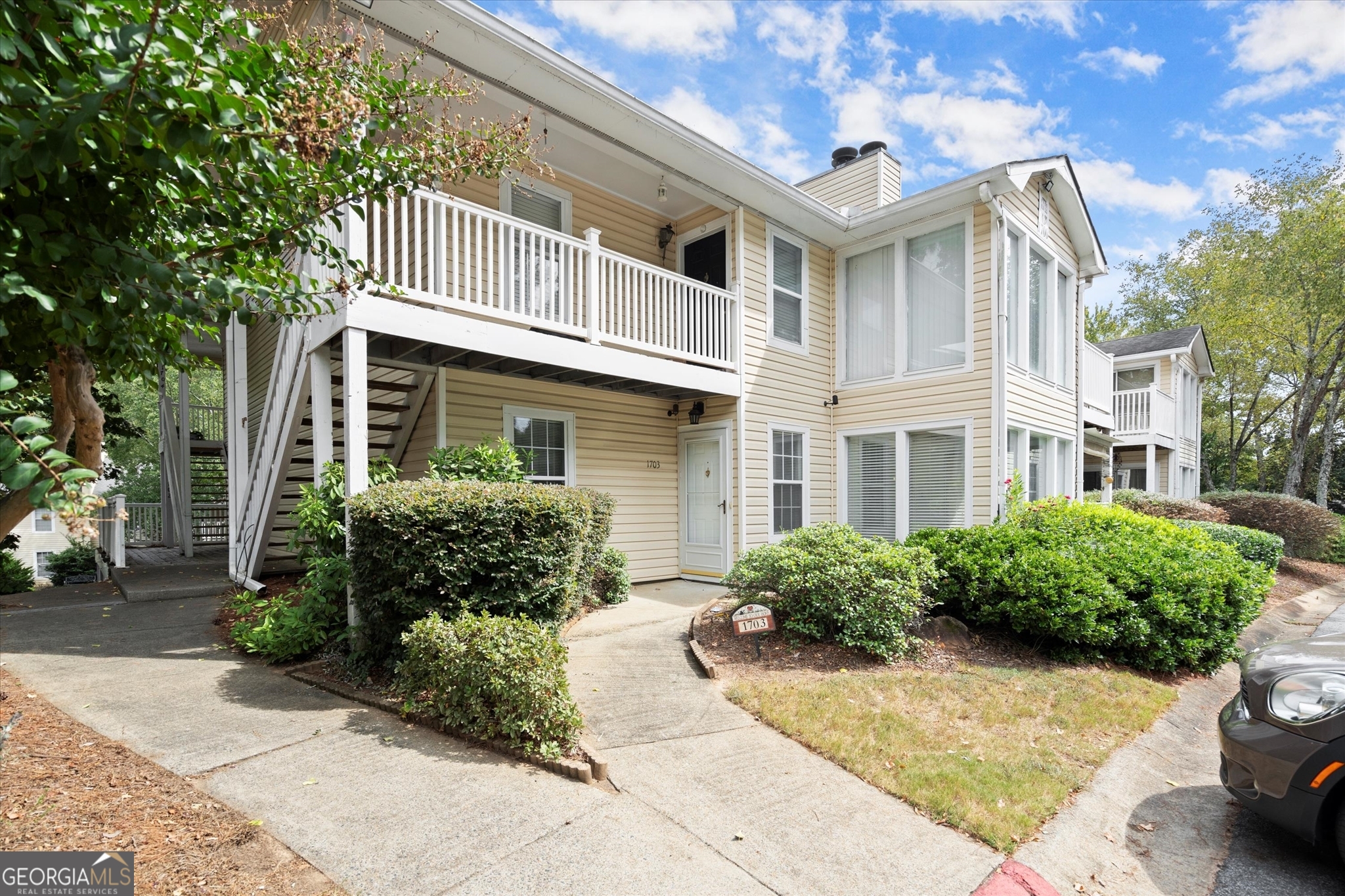 Discover this beautiful, move-in-ready 2-bedroom, 2-bathroom condo located in the heart of Marietta! The property features brand-new luxury vinyl flooring, fresh paint, brand-new HVAC, stainless steel appliances, and a tankless water heater. Enjoy a stepless entry and a cozy sunroom that is perfect for a home office or flex space. This home is designed for both comfort and style. The open-concept layout seamlessly connects the spacious living area, dining space, and kitchen, making it ideal for entertaining or everyday living. Conveniently located just minutes from Life University, KSU, and I-75, and only 20 minutes from downtown Atlanta, you'll have easy access to shopping, dining, and everything the city has to offer. Whether you are a first-time buyer, downsizing, or an INVESTOR looking for a prime opportunity, this condo meets all your needs! No rental restrictions, and FHA approved.