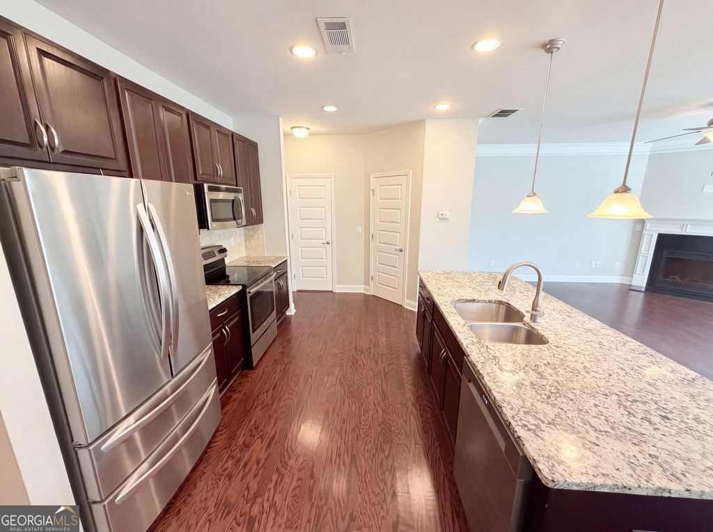 Photo of 10555 Naramore Lane, Johns Creek, GA 30022 (MLS # 10753650)