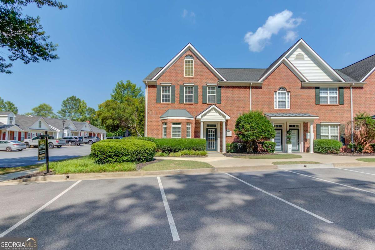 We are pleased to offer for sale a newly remodeled executive office building on N Main St., in the heart of Historic Downtown Alpharetta! 2-Story spacious end-unit office condo in the Main Street Commons Office Park. Brand new tile entry, halls and conference room. Modern plush commercial carpet in each office. The main floor has 3 designated offices, a conference room/showroom, kitchen, bathroom, and reception/welcome area! Second level has 4 designated offices and a copy room, bathroom and an open reception area. Would be ideally suited for any professional business. The community association covers community grounds, the exterior of the building to include roof, trash collection, water & sewer.