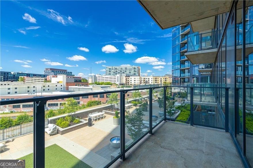 Luxury condo in west midtown. Amazing studio with floor-to-ceiling windows with a view of the city. Sleek kitchen with stainless steel appliances, quartz countertops, and hardwood floors. Bathroom with a frameless showing and walk-in closet. Secure Access with 24/7 Concierge and resort-style amenities including a fitness center, outdoor grilling areas, heated saltwater pool, whirlpool spa, clubroom with billiards and lounge, shuffleboard plenty, and TVs. Walking distance to the restaurants, shops, and bars. Minutes from the Beltline trail and the Westside Park. All appliances, washer and dryer are included with the sale.
