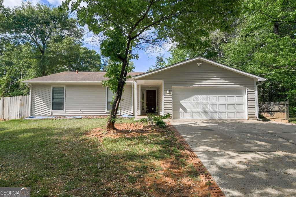 Photo of 1195 Indian Way NW, Lilburn, GA 30047 (MLS # 10756058)