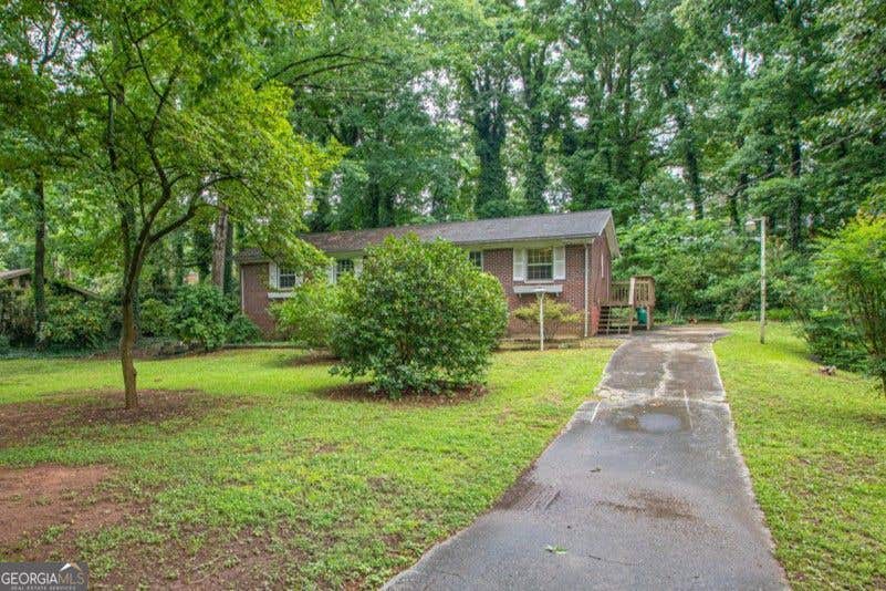Photo of 442 Stonewood Drive, Stone Mountain, GA 30087 (MLS # 10827661)