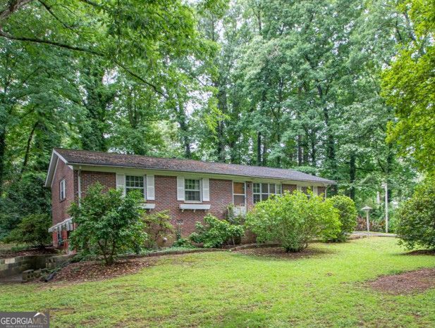 Photo of 442 Stonewood Drive, Stone Mountain, GA 30087 (MLS # 10827661)