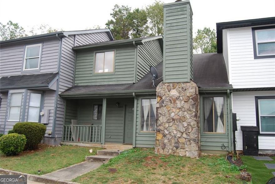 **Up to $8,350 in down payment assistance available to qualified homebuyers from Preferred Lender!**  Great Value and Endless Possibilities in Wellington Manor! This 3-bedroom, 2-bath townhome offers incredible potential at a price below market value. The primary suite on the main level provides easy living, with two additional bedrooms upstairs for family, guests, or a home office. With a little fresh paint, new carpet, and personal touches, this home can truly shine. The systems are older but functional, giving you the opportunity to update over time while enjoying instant equity. A small fenced backyard provides privacy and space for pets or outdoor relaxation. Conveniently located near shopping, schools, and I-20, this home is perfect for a buyer ready to make it their own and add value along the way. Sold as-is.