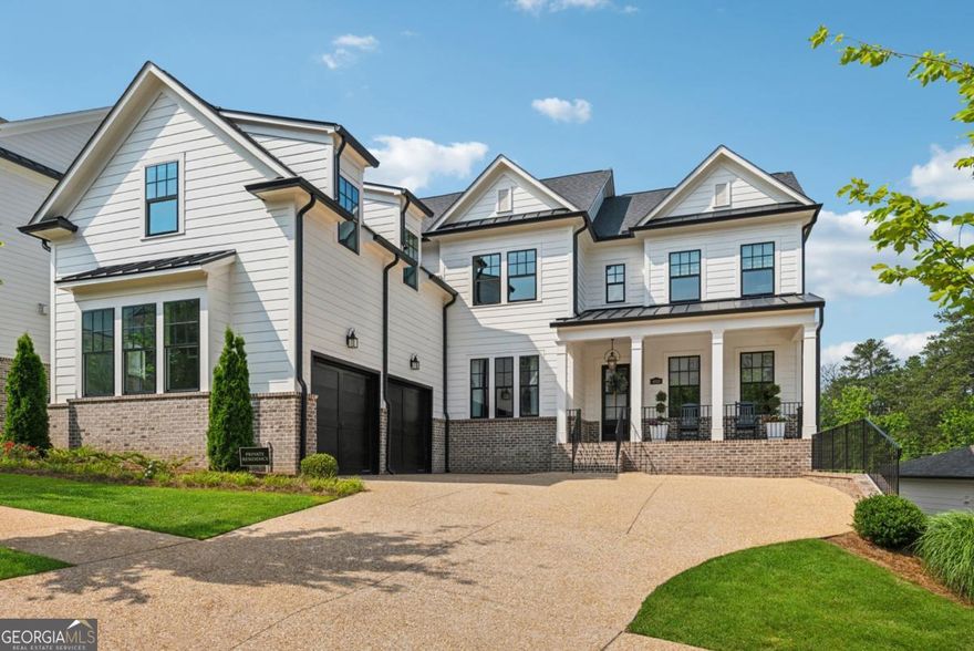 An exquisite residence that truly stands out-better than new and beautifully designed. Nestled in the prestigious Hillandale community, just minutes from Historic Downtown Roswell and offering a rare combination of classic elegance blended with contemporary style, this rare basement home features an open concept layout with upgraded finishes. Gracing one of the larger and most coveted lots in the community, the expansive backyard presents an opportunity for elevated outdoor living-perfectly suited for daily enjoyment, entertaining, or creating your own custom pool retreat. From the charming rocking chair front porch to clean traditional lines, columns, and elegant gas lanterns, the exterior invitation sets the tone for what lies within. Inside, you'll find an open, light-filled floorplan that flows effortlessly from foyer to study, dining room to casual living. The heart of the home is the gourmet kitchen, a chef's dream complete with a large island breakfast bar, natural stone countertops, stainless steel appliances-including double ovens, a gas cooktop, and refrigerator-as well as ceiling-height cabinetry, a spacious walk-in pantry, and powder room. A thoughtfully designed mudroom connects the kitchen to the garage, offering everyday practicality with style. Just off the kitchen, an enclosed patio to indulge year round. Retreat to the luxurious owner's suite, a serene haven featuring a massive walk-in closet, a true spa-inspired bath with dual vanities, soaking tub, and frameless glass shower. Every detail has been curated for ultimate comfort and relaxation. Additional highlights include a main-level guest suite with a private ensuite bath, and a versatile loft upstairs-perfect for a media room, home office, gym, or playroom. Rich white oak hardwood flooring extends throughout the main living areas, adding warmth and sophistication. The unfinished daylight terrace level is stubbed and ready to be transformed to suit your vision-whether it's a home theater, wine cellar, or additional living space. Don't miss this rare opportunity to own a truly remarkable home in one of Roswell's most desirable communities.