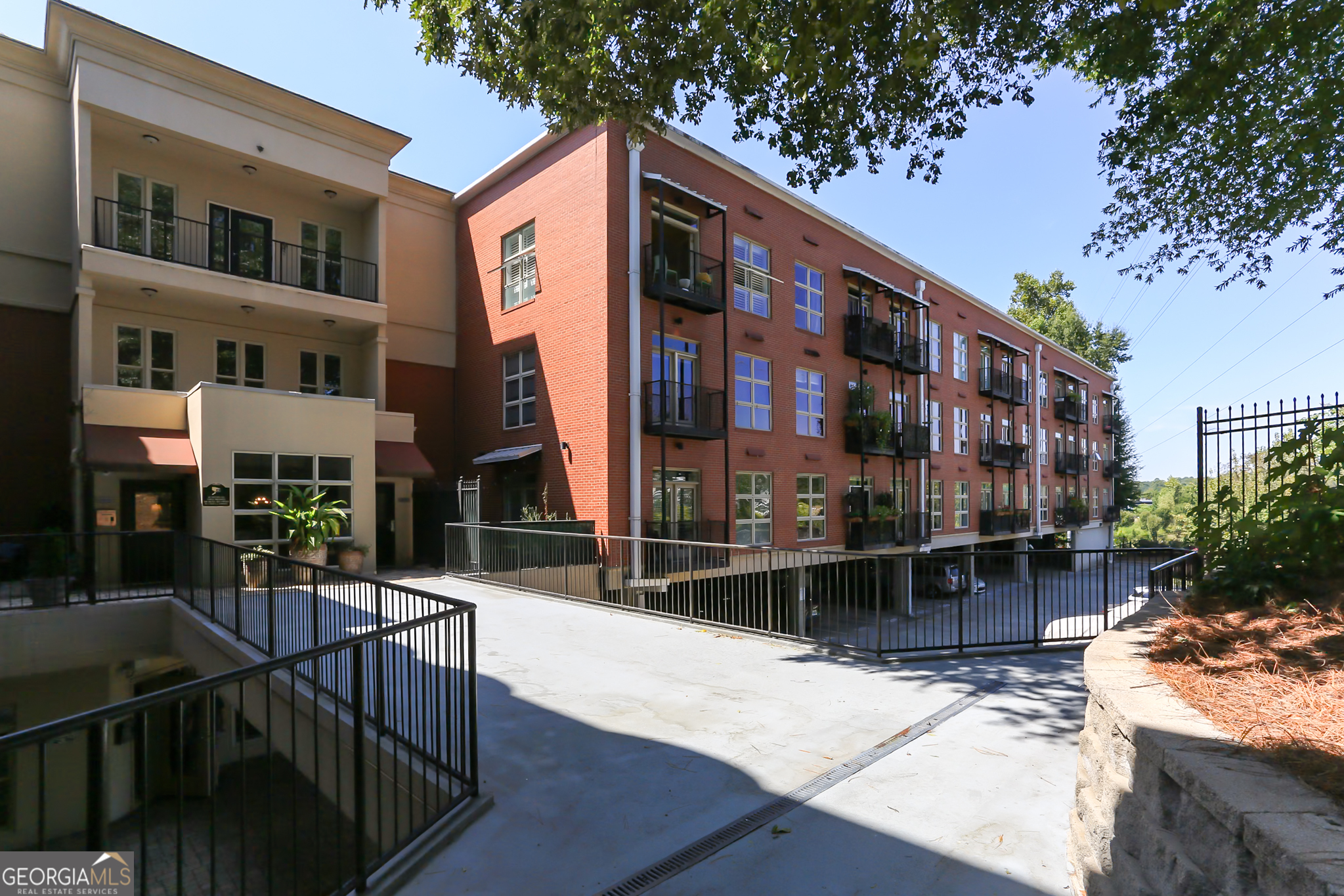 Top floor end-unit lovingly maintained by only one owner! Get the best of both worlds at this special loft community tucked away on a quiet dead-end street just steps away from Piedmont Park, the Beltline, retail and dining. As soon as you walk in, you will be wowed by the polished concrete floors, high ceilings and expansive open floor plan. Situated on a side of the building that gets the morning sun and tons of natural light, you will love looking out the wall of oversized windows onto treetops and sitting out on the balcony to soak it all in. The updated kitchen features granite counters, tons of storage, stainless steel appliances and an effortless flow to both the living and dining areas. The primary suite is the perfect place to relax and unwind and there is also a guest half-bath in the hallway. Lofts at the Belvedere is secure and gated, very pet-friendly, has a pool, private dog park, courtyard and incredibly easy access to everything Midtown has to offer.