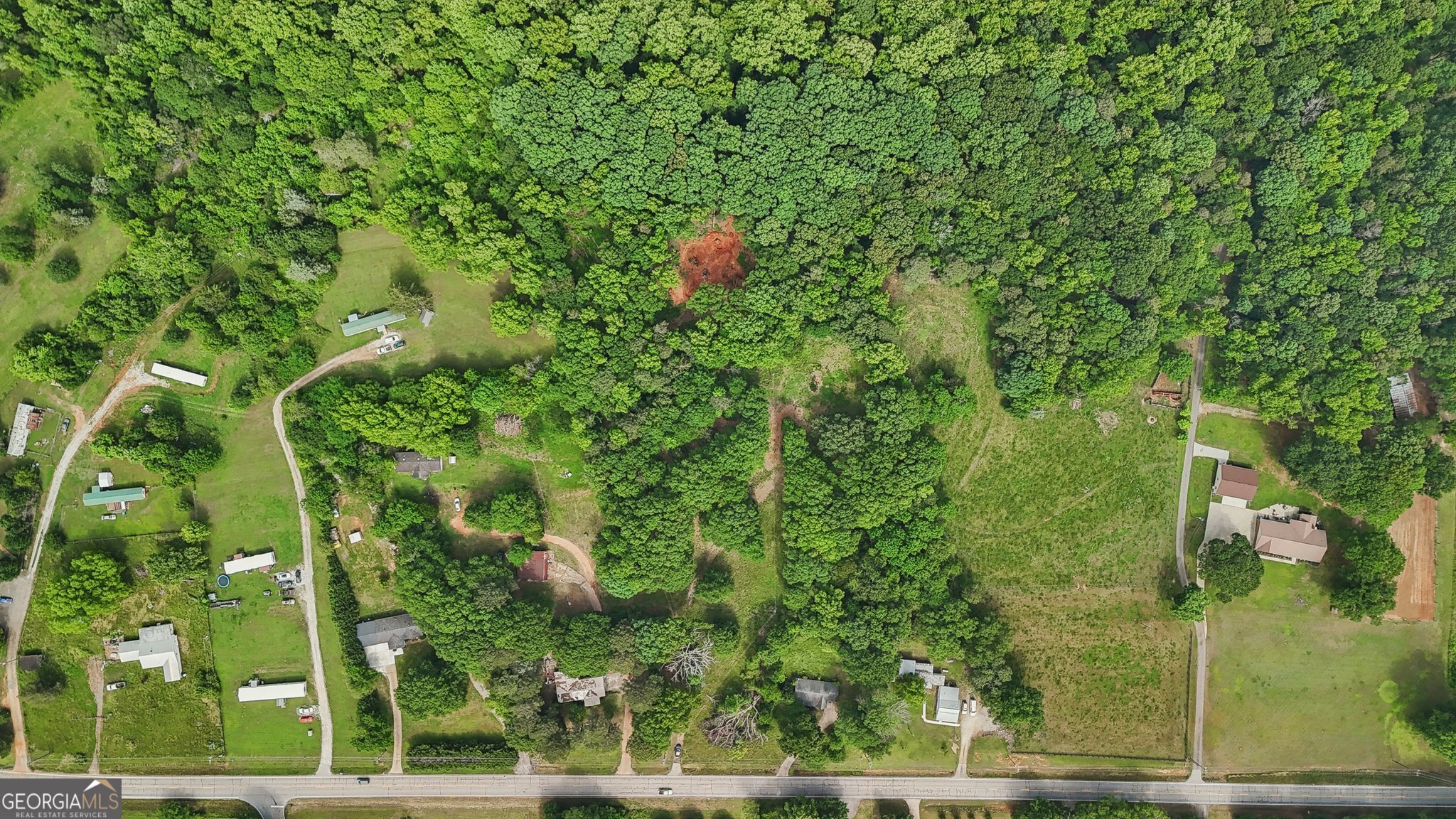 Build your dream home on this beautiful 1.53-acre wooded lot in Jefferson, GA. This R3 Residential lot offers a peaceful, natural setting to build your next home. A driveway has already been started for you, making it even easier to begin construction. The property has access to city water and electricity, so utilities are ready and available. With plenty of space to build and mature trees providing privacy and charm, this lot is ideal for a custom home or investment property. Located just minutes from downtown Jefferson, local schools, and shopping, this property offers the perfect balance of tranquility and convenience. DonCOt miss this opportunity to create something special in one of GeorgiaCOs most desirable communities.