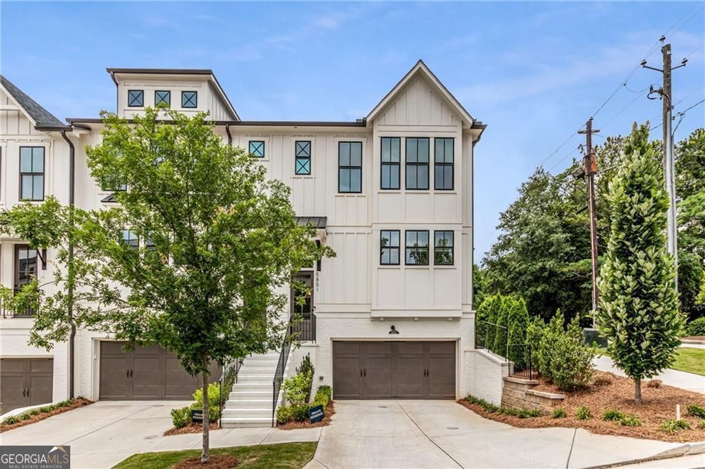 Welcome to this stunning, modern townhouse that showcases the perfect blend of contemporary elegance and comfortable living. This impressive, model residence features a meticulously designed exterior with clean lines and a charming color palette, creating an inviting first impression. Situated in a desirable location, the property is surrounded by lush landscaping, including well-manicured shrubs and trees that add a touch of natural beauty to the setting. Upon entering, you are greeted by a spacious foyer that leads to a stylish staircase, setting the tone for the interior. The open-concept layout seamlessly connects the living, dining, and kitchen areas, making it ideal for both everyday living and entertaining guests. The living space features large windows that bathe the room in natural light. The fireplace warms the space perfectly. The gourmet kitchen, houses ample cabinetry and state-of-the-art appliances that cater to all your culinary needs. An expansive island provides additional counter space and doubles as a casual dining area, perfect for hosting gatherings. The dining room offers a stylish setting for formal meals, with elegant lighting that enhances the atmosphere. The home includes multiple bedrooms, each designed with care and attention to detail. The main bedroom serves as a tranquil retreat, equipped with abundant windows that offer motorized black out shades. The ensuite bathroom is opulent, featuring modern fixtures, a luxurious shower, and dual vanities that emphasize elegance and functionality. The main bedroom al so features a custom finished closet as well as an additional closet. Each additional bedroom is generously sized, providing ample closet space and a welcoming ambiance for family or guests. Multiple bathrooms throughout the home have been thoughtfully designed to ensure comfort and convenience. For your comfort, the property boasts a versatile area that can be utilized as a home office, media room, or guest suite, catering to your unique lifestyle needs. Step outside onto the deck where a serene outdoor space awaits you, perfect for summer barbecues or simply enjoying the afternoons in the open air. Conveniently located near shopping, dining, and recreational opportunities, this townhouse provides an exceptional urban lifestyle without compromising on comfort or tranquility. This property is not just a house; it's a place to call home-where memories are created and cherished for years to come. Schedule your private showing today and experience this exceptional property firsthand.