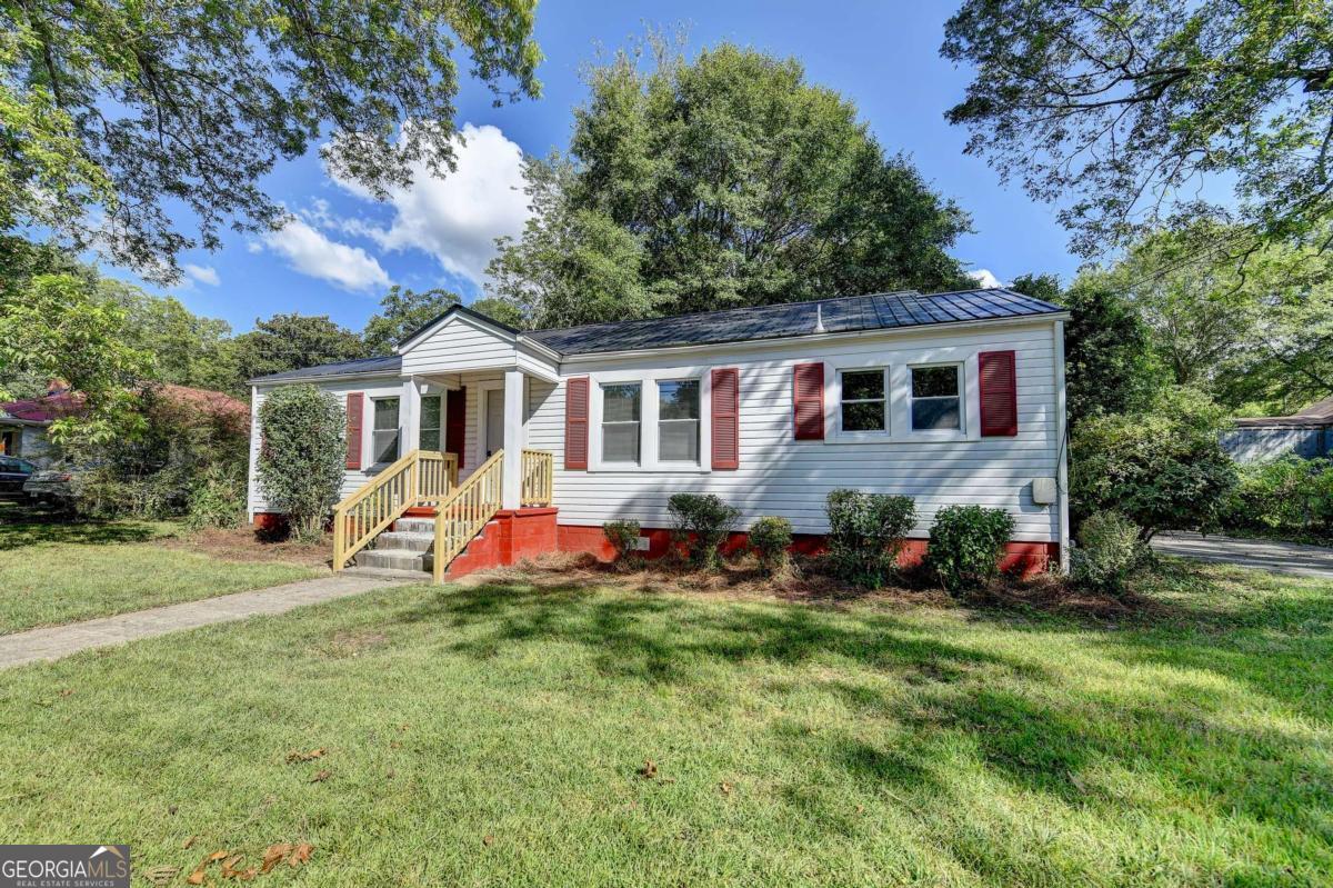 Your Perfect Blend of Character & Convenience! Step into this charming 2-bedroom, 1-bath gem (with bonus room!) offering 1,250?sq?ft of cozy living space in the heart of Winder. Built in 1965 and lovingly updated, this home blends timeless charm with modern amenities. Hardwood Floors Throughout - Real original hardwoods paired with freshly resurfaced floors add warmth and elegance in every room. Versatile Bonus Room that you can make very cozy den, home office, or third bedroom-the choice is yours! The stone fireplace adds a nice focal point in the living room, it's perfect for chilly Georgia nights and intimate gatherings. Sleek and durable granite countertops which elevates the kitchen with a refined, high-end feel. Long-lasting and energy-efficient metal roof adds peace of mind and style. Ample parking wraps all around the home, ideal for family vehicles, guests, or even a boat or RV. Perfectly situated in vibrant Winder, walk or drive to downtown shops, quaint cafes, and community events. Fort Yargo State Park and local greenways are just minutes away for those who love outdoor adventures. Schedule your private showing today and see firsthand why this one is the perfect place to call home!