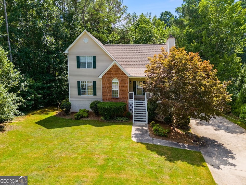 Here it is! A home to MAKE MEMORIES in the sought-after Cottage Grove neighborhood in the Central school district! You won't find many homes that offer this! SO MUCH SPACE in this beautiful home with 5 bedrooms, you have a space for everyone and your guests! With so many possibilities, this home has it all! Move-in ready with hardwood flooring in the foyer and kitchen/dining, NEW HVAC and carpet installed less than 1 year, gas fireplace in the expanded living room, UPDATED lighting and ceiling fans! Stainless steel appliances adorn the kitchen, with a fridge included! Spacious owner's suite with large soaking tub, separate shower, and walk-in closet on the main level. Upstairs, you'll find 2 generous bedrooms, with a large 3rd room that can be a bedroom, rec room, bonus space for an office, crafting, or additional living space. Downstairs, you'll find a spacious room for an optional 5th bedroom with a full bath, which also could be a media room, exercise room, or any addition of your BIGGEST HEARTS DESIRES! Outside, you'll find a spacious deck with a large pool. Level cozy back yard with garden-style fencing and a storage shed for all your outdoor equipment, with a wooded buffer beyond that makes this property feel so secluded. Just steps away...Don't forget the pond access, where you can fish or take a nature stroll! Schedule your showing today! **Some photos may be virtually staged**