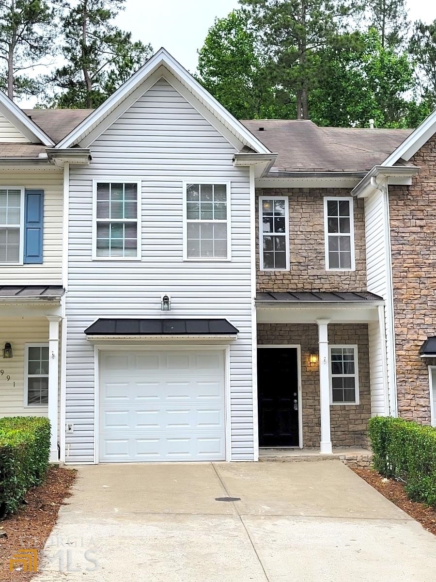 MUST SEE! NO RENTAL RESTRICTIONS! Welcome home to the quiet community of Kentmere conveniently located close to Fowler Park, the greenway and walking trails, fantastic schools, minutes from The Collections and Halcyon, and easy access to the highway. This bright open townhome features gorgeous hardwoods throughout the downstairs and brand new carpet installed upstairs. As you enter through the doors you walk down the hall to an open concept living space. The fabulous eat in kitchen has new stainless steel appliances, and plenty of counter space and storage space. Walk outside to the huge patio area and private wooded backyard to relax and enjoy the sounds of nature. Upstairs you have a split bedroom floorplan with two HUGE master suites, (same size as the 3 bedroom townhomes in the neighborhood) and huge walk in closets. This conveniently located neighborhood is zoned for highly rated schools and is the perfect place to call home. Trash and water is included in the HOA.