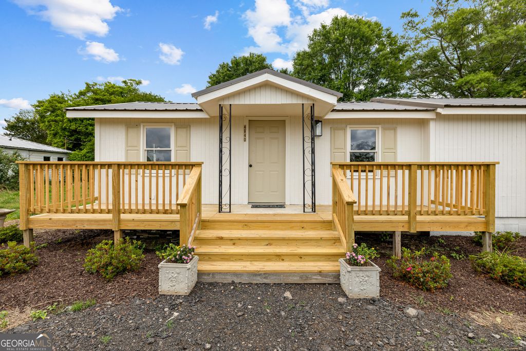 Photo of 4840 Highway 54, Sharpsburg, GA 30277 (MLS # 10762470)