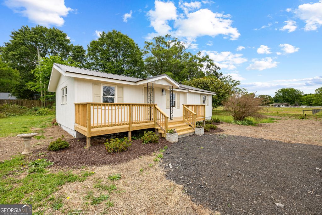 Photo of 4840 Highway 54, Sharpsburg, GA 30277 (MLS # 10762470)