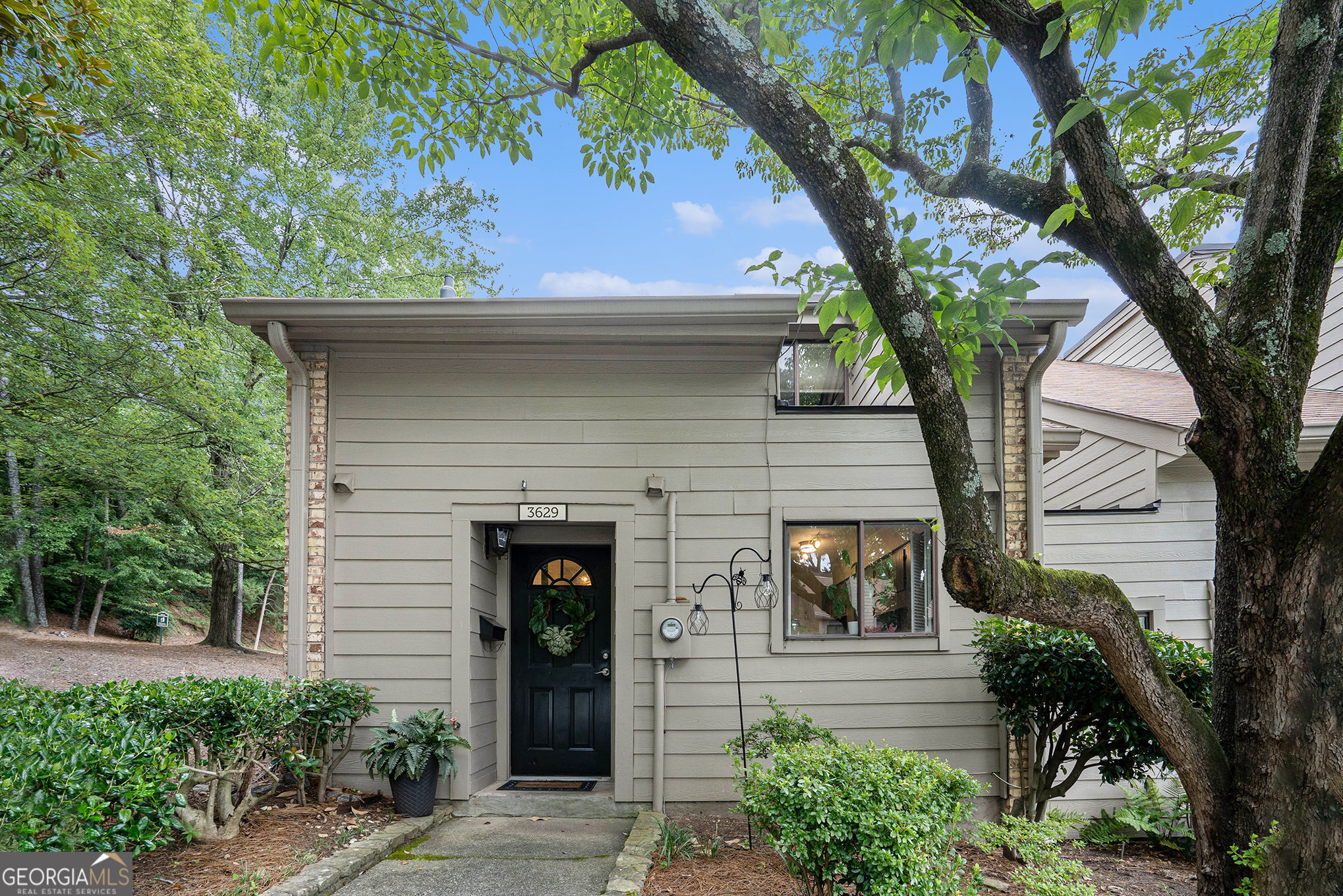 Discover the most cost-effective city living in the area-this beautifully updated condo offers unbeatable value, style, and location. Enjoy the convenience of being within walking distance to fine dining, Cumberland Mall, Cobb Galleria, and The Battery, and less than 5 minutes from major highways I-75 and I-285, making commuting and entertainment effortless. From the moment you arrive, you'll be impressed by the great curb appeal, lush landscaping, and welcoming entryway. Inside, brand-new flooring flows into a spacious living area, where newly added architectural beams create the vaulted high-beam ceilings, adding warmth and sophistication. This home is perfect for professionals, first-time buyers, or anyone seeking an elegant, low-maintenance lifestyle in an exceptional location at an affordable price. Don't miss your chance to own one of the best values in metro Atlanta!