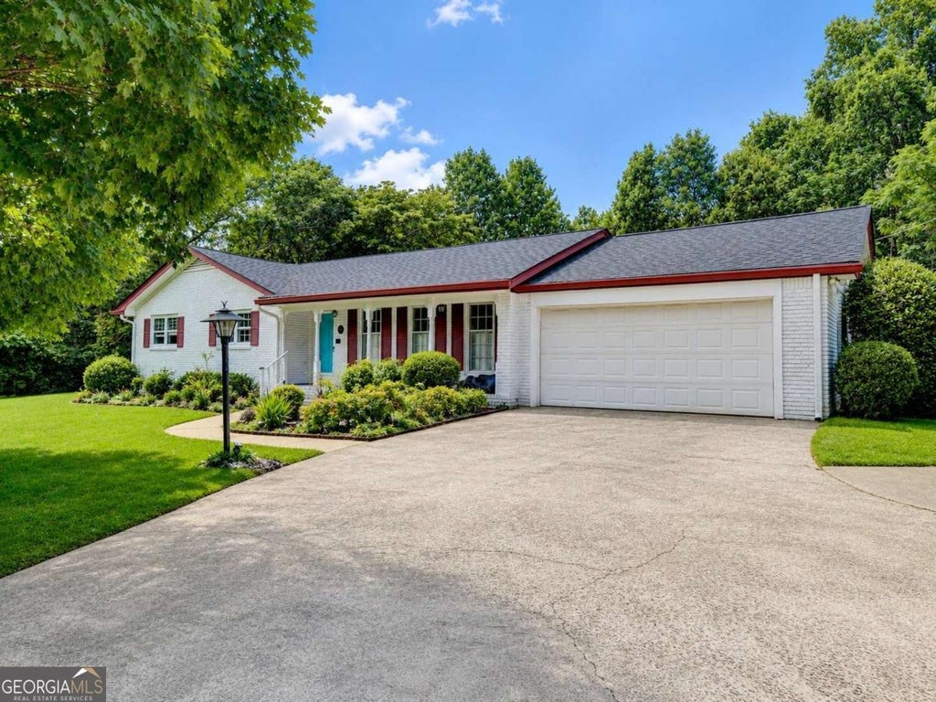 Photo of 4875 Five Forks Trickum Road SW, Lilburn, GA 30047 (MLS # 10814539)