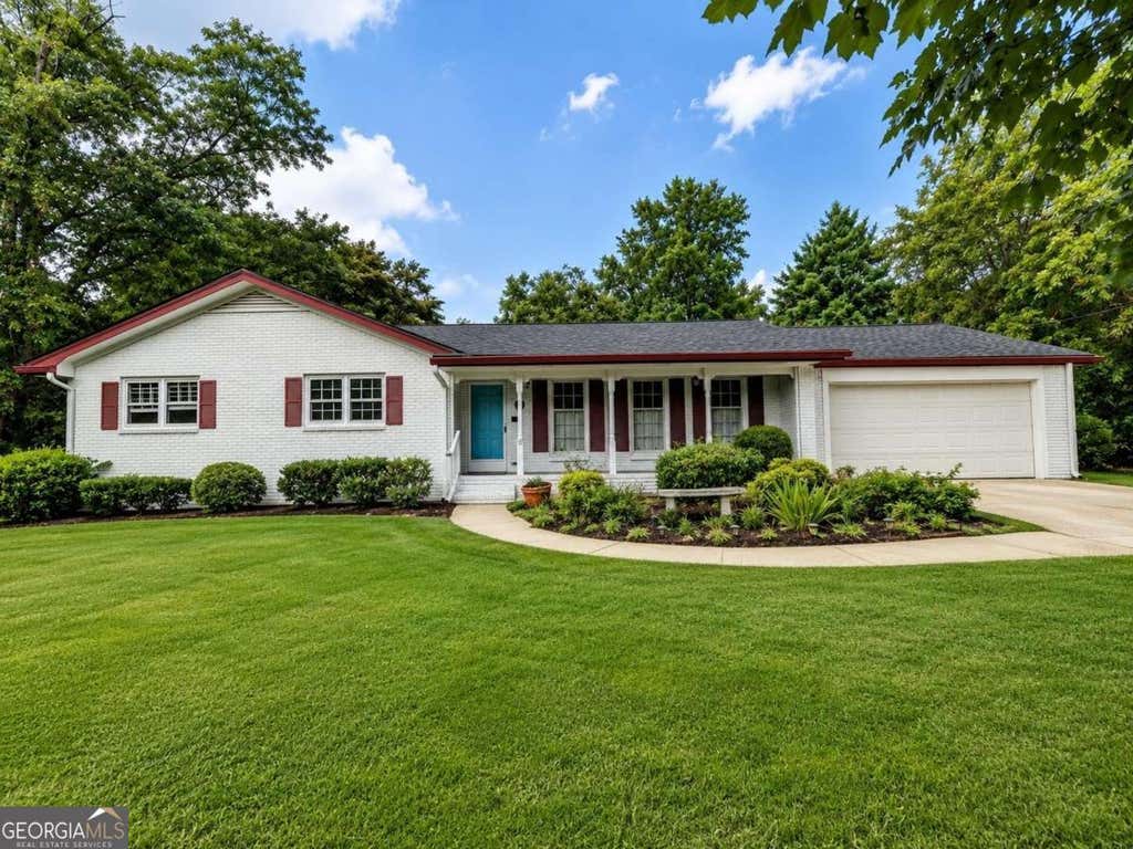 Photo of 4875 Five Forks Trickum Road SW, Lilburn, GA 30047 (MLS # 10814539)