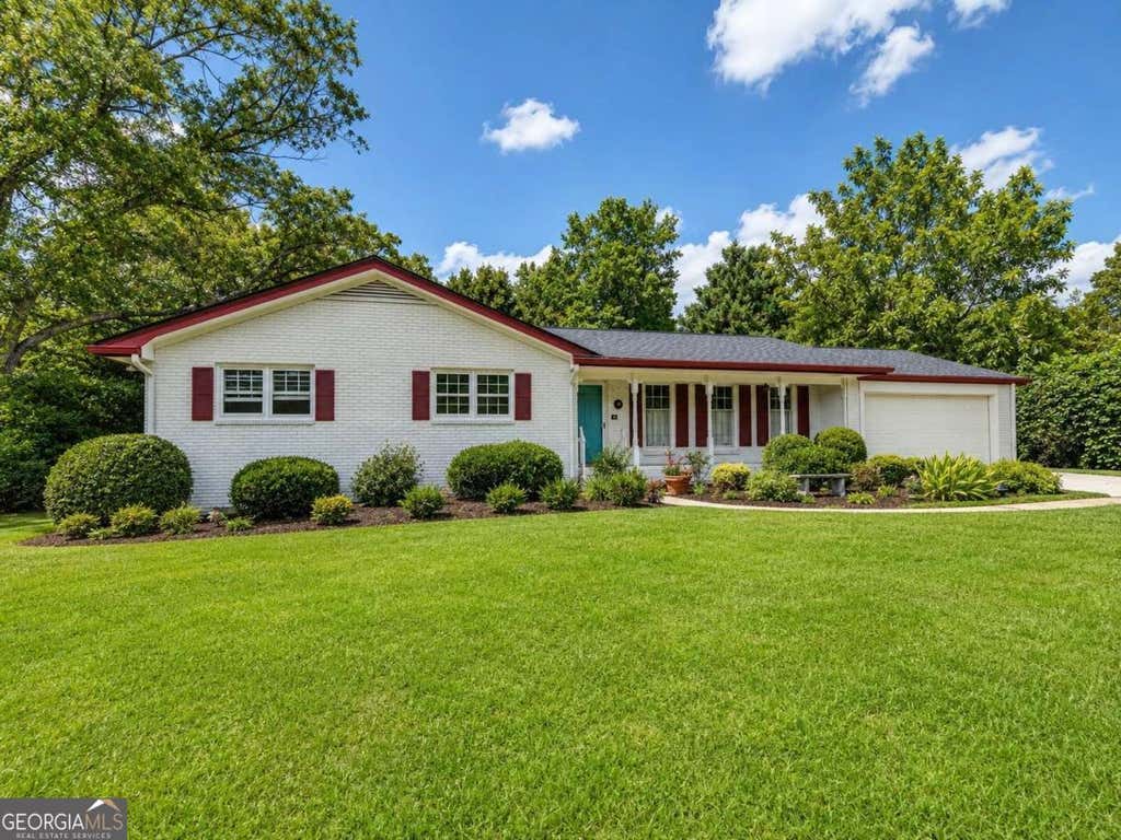 Photo of 4875 Five Forks Trickum Road SW, Lilburn, GA 30047 (MLS # 10814539)