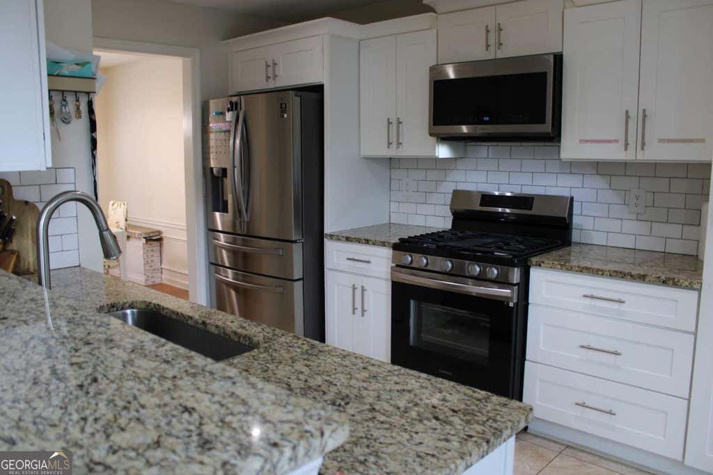 Photo of 2675 Binghampton Lane, Lawrenceville, GA 30044 (MLS # 10777088)