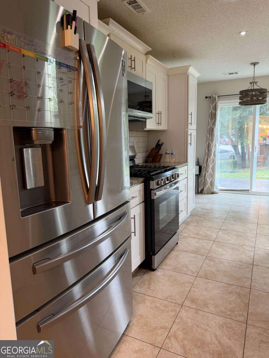 Photo of 2675 Binghampton Lane, Lawrenceville, GA 30044 (MLS # 10777088)
