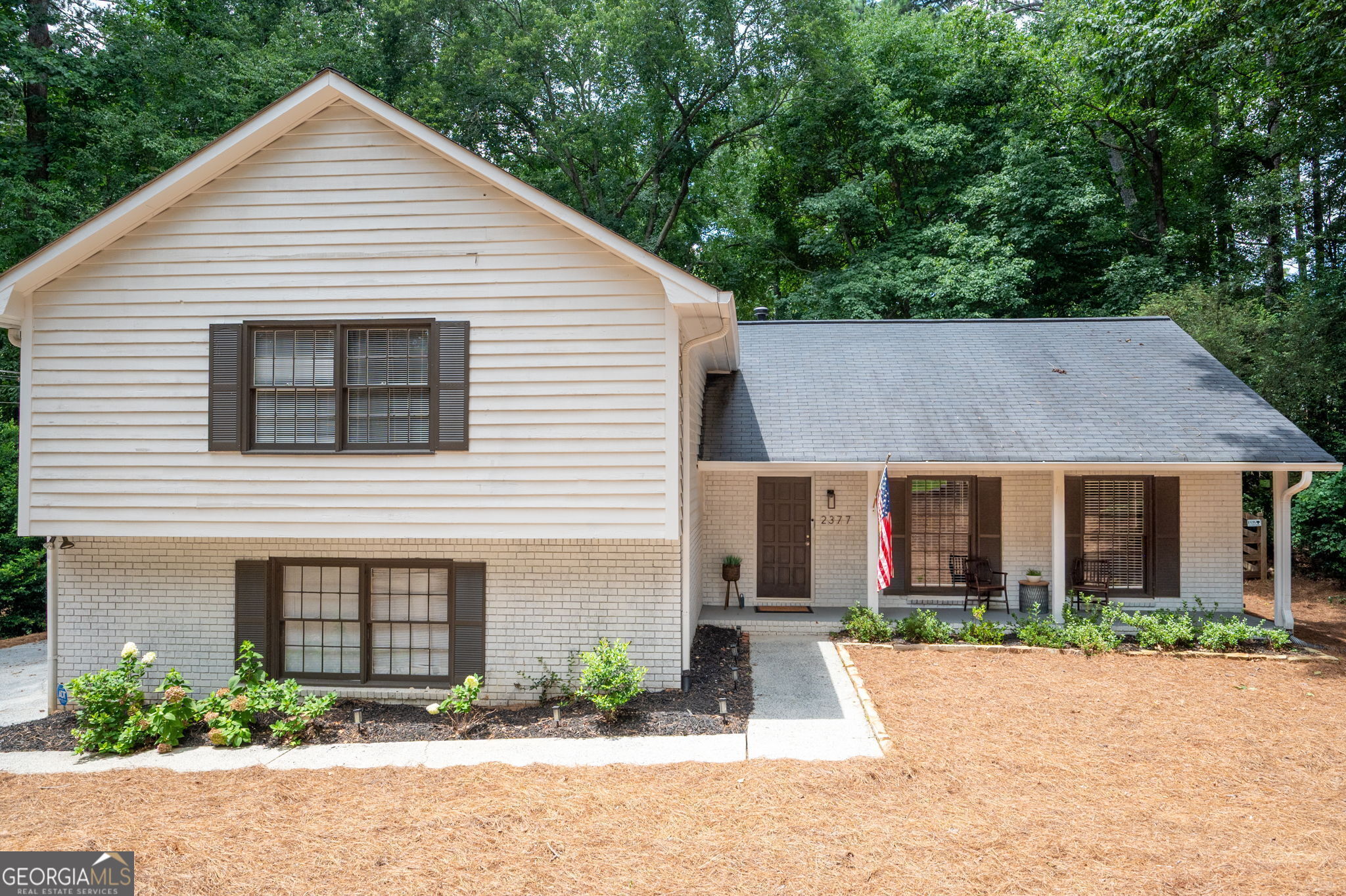 This impeccably renovated traditional home in the heart of East Cobb offers 4 bedrooms, flex room and 3 full baths. On just over half an acre this standout property perfectly blends comfort, style and outdoor living. Open concept floorplan features beautiful barnwood beams, seamless flow into the gourmet kitchen with oversized island, quartz countertops, white shaker cabinets, stainless gas range, breakfast bar, pantry and dining area overlooking the yard. The renovated baths include a primary ensuite, main bath with double vanity and modern finishes. The spacious primary bedroom also features a walk in closet with custom shelving. Three additional bedrooms and a bath are located on the upper floor. The flexible lower level bedroom w/full bath access is perfect for guests, cozy den or home office. The inground salt water pool with updated liner, expansive deck and a low maintenance yard is tailor made for summer gatherings. This amazing property is close to shopping, dining, park and the vibrant Marietta Square.