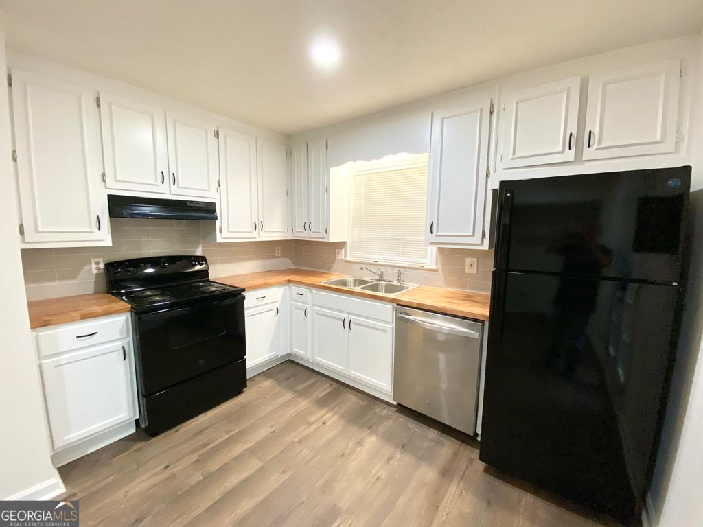 Photo of 4017 Burns Road NW, Lilburn, GA 30047 (MLS # 10768590)