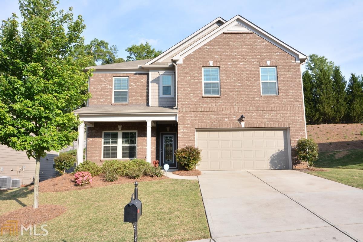 Like New Suwanee Home. GUEST Suite w/ Full Bath on main level. Neutral colors & hardwoods on main. Open concept living perfect w/gourmet kitchen open to breakfast area & living room. Kitchen boasts SS Appliances, upgraded cabinets, granite w/ tile backsplash, recessed can lights & pantry. Fam. Rm w/ marble surround fireplace & views of backyard. Mstr suite w/large WIC, bath w/dbl van., dark stained cab., garden tub & tiled shower. Great space for entertaining, living & growing. Fantastic Gwinnett Co. Schools.