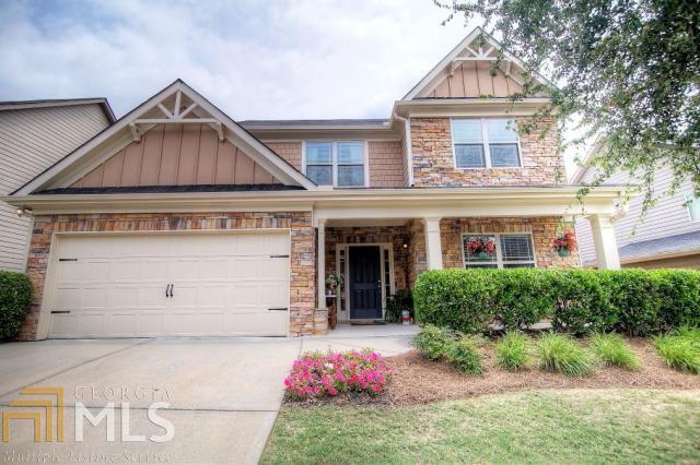 Stunning Craftsman Style Home With $20K+ In Upgrades Throughout Home.Lright,open floor plan for today's lifestyle.Rich hardwood floors on the main level.Gourmet kitchen with recessed lighting,stained cabinets,granite counters & stainless appliances opens to the spacious fireside family room.Large vaulted master bedroom opens to garden bath with dual vanities.All baths & laundry room have tile flooring.Upgraded lighting, neutral designer paint.Spacious secondary bedrooms.Patio overlooks incredible level backyard perfect for children & pets.Wonderful amenities. Must see.