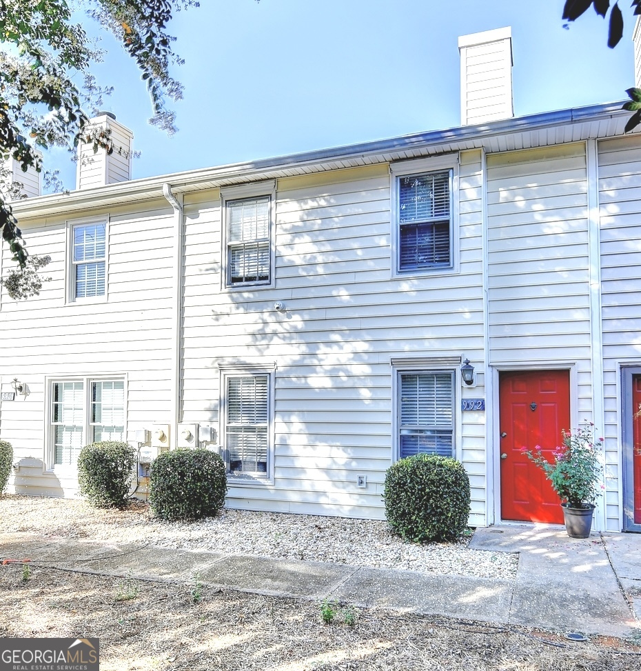 Ready Move in the beautiful Town house at the BEST location with the most AFFORDABLE price. 2bd / 2.5 bath townhome is located in the HEART of NORTH ATLANTA! You will be a 10-15 MINUTES drive from Alpharetta's AVALON, North Point Mall, Perimeter Mall, and Downtown Roswell. GROCERY is 5-10 MINUTES to Whole Foods, Trader Joes, Costco, and Kroger/Publix. Highway access is 3-5 MINUTES to GA-400. 10 MINUTES to I-285. This home is PERFECT for commuters and investors that want ACCESS to all amenities of Metro and Central Atlanta. NEW upgrades: New LUXURY Wood-like flooring; New. PAINT through out the house; NEW STONE kitchen countertops to be installed. Bedroom has a PRIVATE bath & WALK IN closet. SPACIOUS half-bath on main floor featuring a Laundry CLOSET. This townhome has a PRIME location with QUICK access to community's POOL and walking routes. Each home has 2 COVERED parking spaces, and additional parking is available in nearby lot.