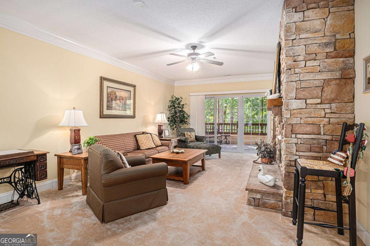 Enjoy low-maintenance living in this second-floor unit overlooking the scenic Kingwood Resort Golf Course. This 2 bedrm, 2-bathrm condo is move-in ready-ideal for vacations or full-time living. The spacious primary suite features a large bathroom w/ a separate shower, garden tub, walk-in closet, & private water closet. A washer & dryer are conveniently located in the hallway & an assigned parking space is included. Screened in porch is accessible from the main living and primary suite and becomes your favorite place to enjoy meals, have a cup of coffee during our wonderful weather months. Optional membership to Kingwood Resort grants access to 2 pools, a fitness center, golf, & more. Located just minutes from downtown Clayton, you'll enjoy fine dining, boutique shopping, & endless outdoor adventures-mountain lakes, waterfalls, rivers, three state parks, horseback riding, & local wineries await.