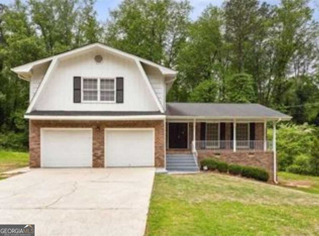 Enjoy this beautifully updated, foursided brick residence built in 1972, situated on a generous halfacre lot in Stonecrest. Inside, gleaming hardwood floors flow through the main living areas, while fresh paint and modern finishes brighten the space. The kitchen has been upgraded with stone countertops and cabinetry, complemented by new vanities in the bathrooms. A recently replaced HVAC system and roof offer peace of mind. The finished basement expands your living potential-ideal for recreation or work. Outside, you'll find a spacious yard perfect for gardening or entertaining. Located minutes from shopping, parks, and expressway access, this wellmaintained home combines comfort, convenience, and investment value.