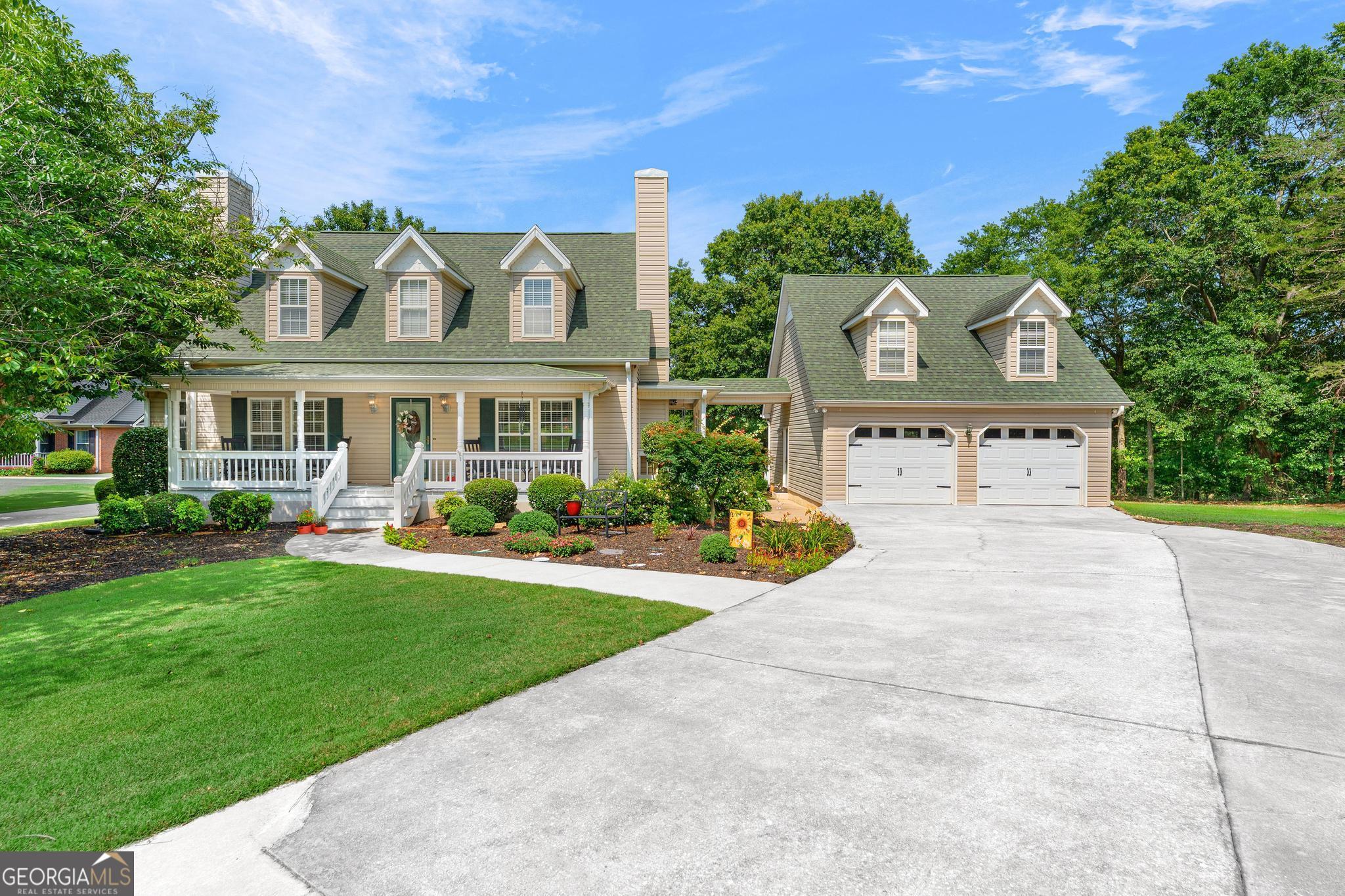 This beautiful Lake Hartwell home in a quiet cul-de-sac offers an idyllic retreat just 3 miles from downtown Hartwell. Located off prestigious Lightwood Road, this property combines convenience, comfort, and charm to create a perfect haven for lakeside living. Key features include 3 spacious Bedrooms and 2 1/2 Bathrooms; Fireplace in the primary; Bonus Room for entertainment or relaxation; Detached Garage with a generous area above, ideal for storage or conversion; Mostly Furnished and Move-In ready with tasteful furnishings already in place. Exterior highlights are a Dock with Jet Ski Port; Close Corp Line; Wrap-Around Porch positioned to face Lake Hartwell, offering spectacular vistas and tranquil outdoor moments; Irrigation System sourced directly from the lake to maintain the lush landscape. Beautiful Lawn expertly manicured for a polished look. Recent updates include a newer roof and updated HVAC system for efficient heating and cooling. This remarkable property is a unique opportunity to own your dream lake home. Combining thoughtful design, enviable location, and modern amenities, it exemplifies elegant lakeside living. Don't miss out on experiencing all that this home has to offer!