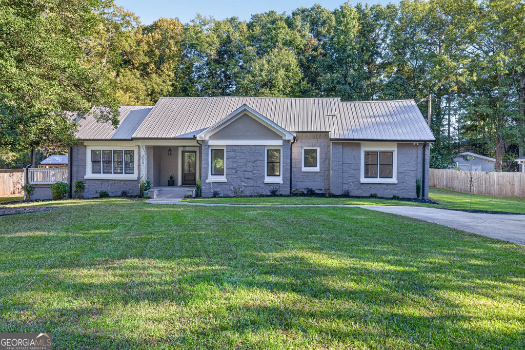 Photo of 255 Woodlawn Avenue, Winder, GA 30680 (MLS # 10877758)