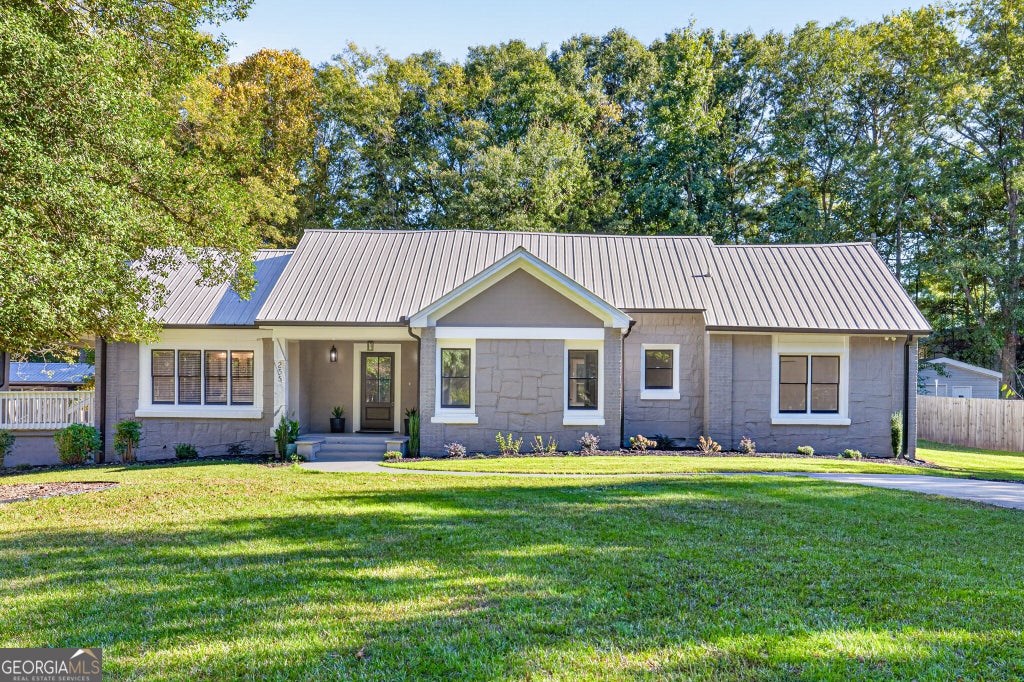 Photo of 255 Woodlawn Avenue, Winder, GA 30680 (MLS # 10877758)