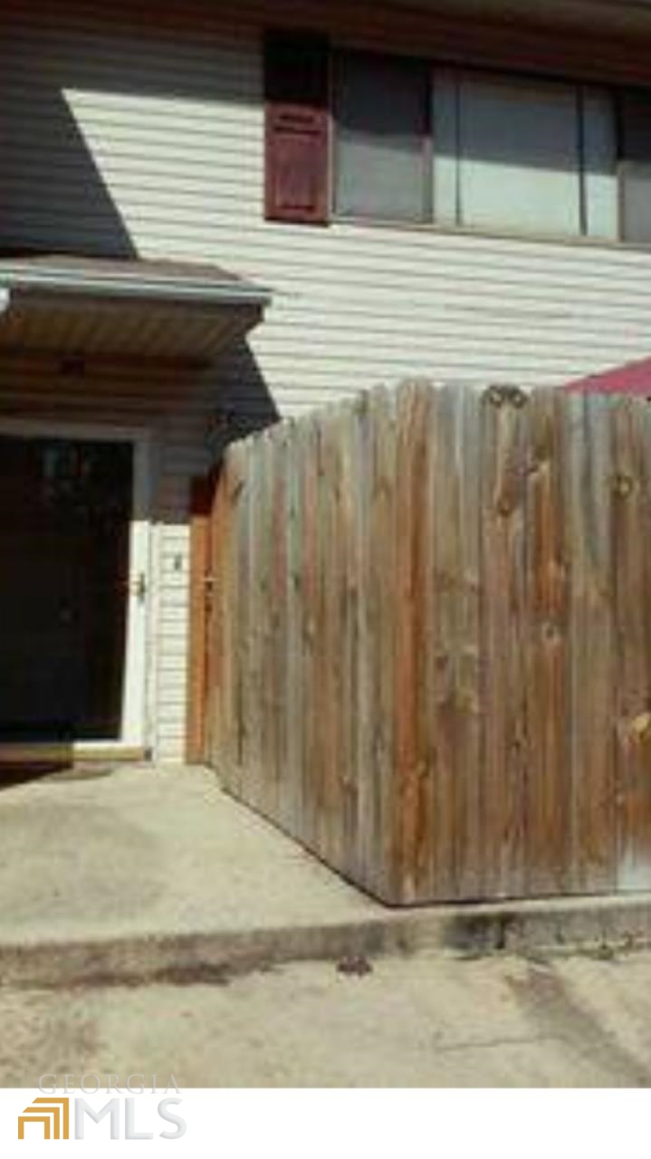 Cozy 2 story all electric 2 bedroom 1 bath condo, close to schools, shopping and Marta!! Beautiful laminate and tiled floors adorn this charming space. Complete kitchen with stainless steel appliances. Water and trash are included in rent. A comfortable privacy patio for those quiet summer nights. This one wont last! Showings are Appt only,