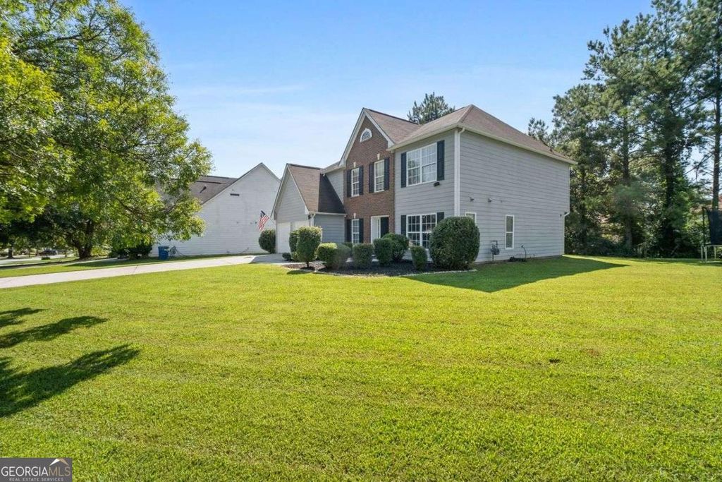 Photo of 6115 Riveroak Terrace, Atlanta, GA 30349 (MLS # 10657194)