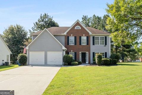 Photo of 6115 Riveroak Terrace, Atlanta, GA 30349 (MLS # 10657194)