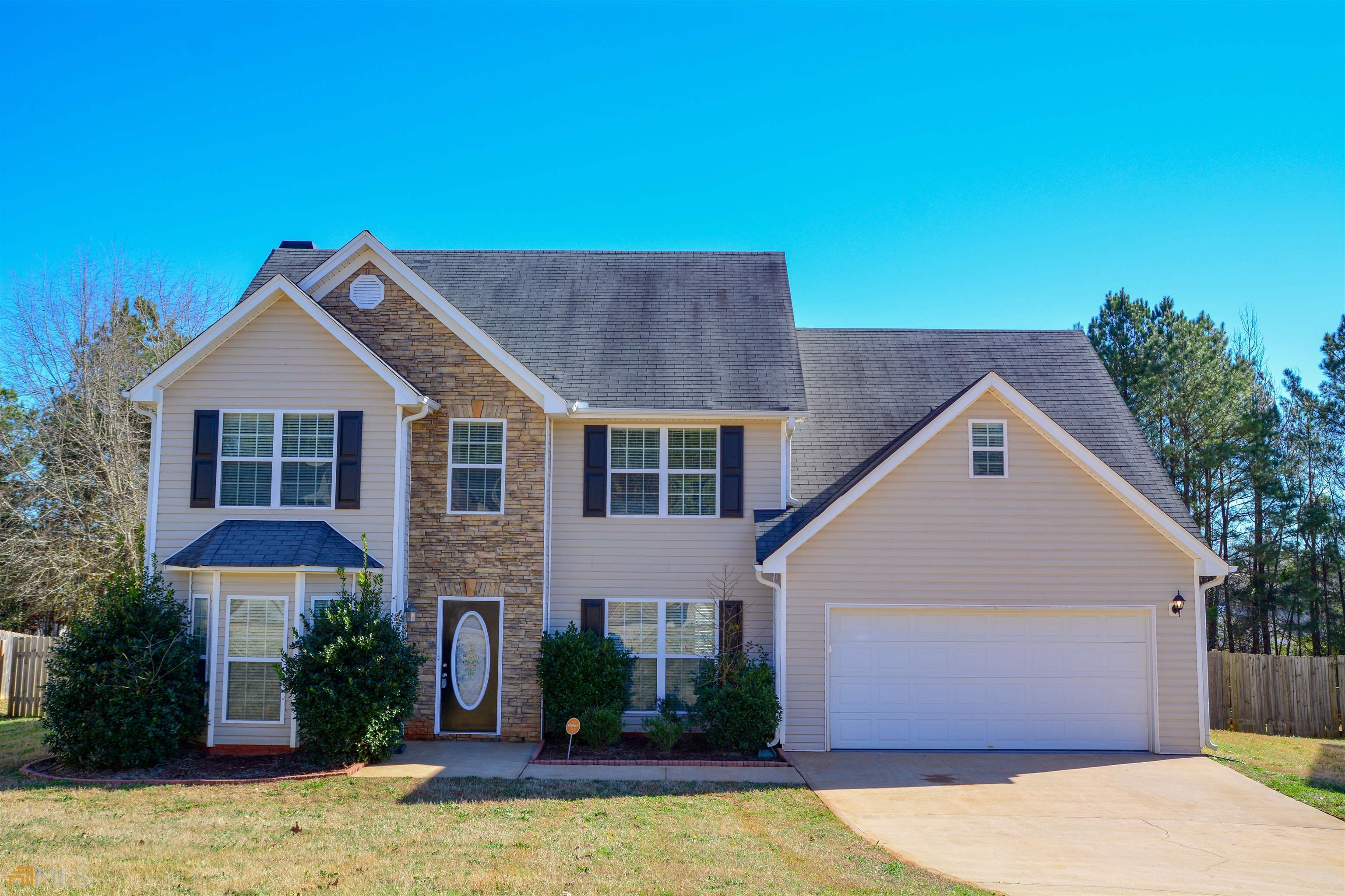 Beautiful 2-story home with 4 bedrooms and 3 bathrooms. The house's exterior features a beautiful stone accent and nice landscaping. The flooring is a mix of marble, hardwood, and carpet in different areas of the house. The living area includes a wood-burning fireplace which is ideal for the chilly winter months. The open kitchen boasts granite countertops, ornate backsplash, oak cabinets, and a breakfast nook. All the bedrooms are upstairs including the enormous master bedroom which features beautiful hardwood floors, 2 walk-in closets, and plenty of windows that let in natural light. It also comes with a master bath which consists of double vanities, a stand-up shower, a toilet, and a garden tub. All the other bedrooms are ample in size. The spacious fenced backyard is perfect for entertainment and outdoor activities. A must see!!