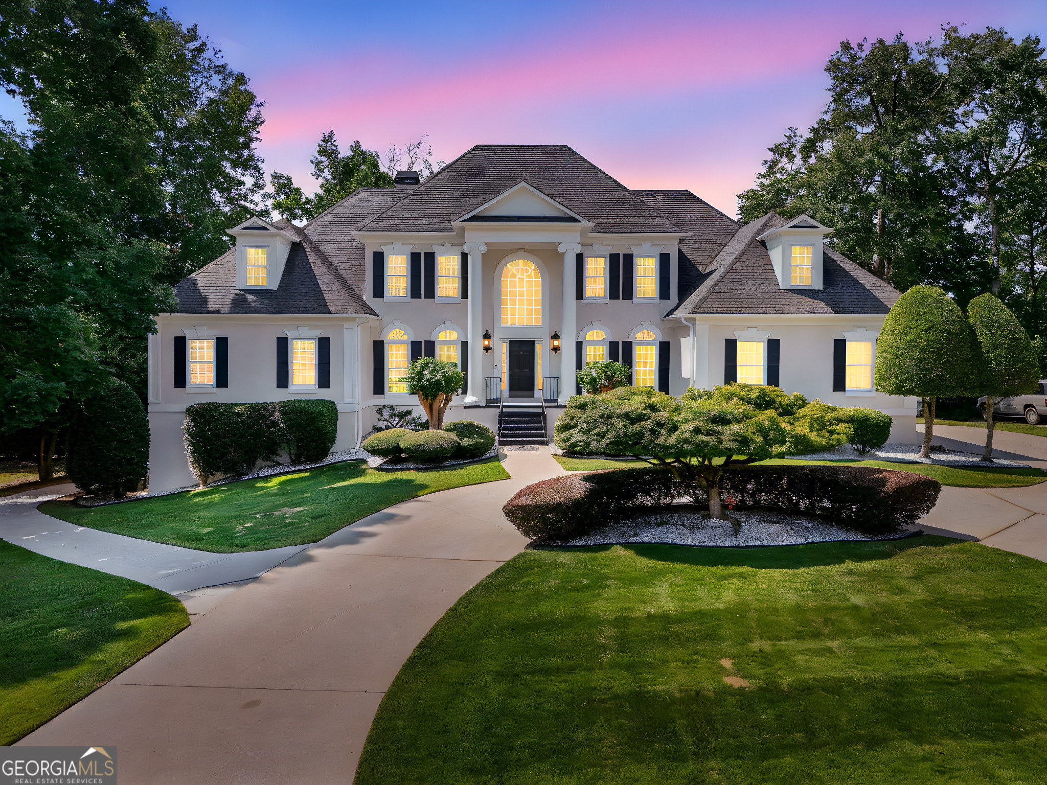 Exquisite Eagles Landing Country Club Home. This captivating home offers the perfect blend of elegance, luxury, and comfort within the prestigious gated community of Eagles Landing Country Club. Step inside through the grand two-story foyer and experience natural light streaming throughout the spacious interior. A formal living room and formal dining room (or executive office) flank the entry, while the chef's kitchen boasts solid surface countertops, a center island with gas range, 42-inch cabinets, and abundant storage. The luxurious two-story family room is truly a showpiece-featuring soaring windows, built-in bookshelves, a cozy fireplace with gas starter, and an upstairs catwalk overlooking the space. The main-level primary suite is a serene retreat with dual vanities, jetted corner tub, and a custom tile shower. Upstairs, three additional bedrooms and two bathrooms which include a suite with flex space and private bath. The fully finished terrace level is an entertainer's dream, complete with a second full kitchen, family room with fireplace, in-law suite, stamped concrete floors, and included professional pool and poker tables. Outdoors, the perfectly manicured grounds showcase a resort-style oasis with saltwater PebbleTec pool, brand-new LED lighting, hot tub spa, outdoor kitchen, expansive deck, and wrought iron fencing. Additional features include fresh interior and exterior paint, dual staircases, three-car garage (including terrace-level bay), and meticulous landscaping. Just minutes to shopping, medical facilities, and I-75, with quick access to Hartsfield-Jackson International Airport and downtown Atlanta. This home is truly exquisite, captivating, and luxurious-offering the finest in upscale living at Eagles Landing Country Club.