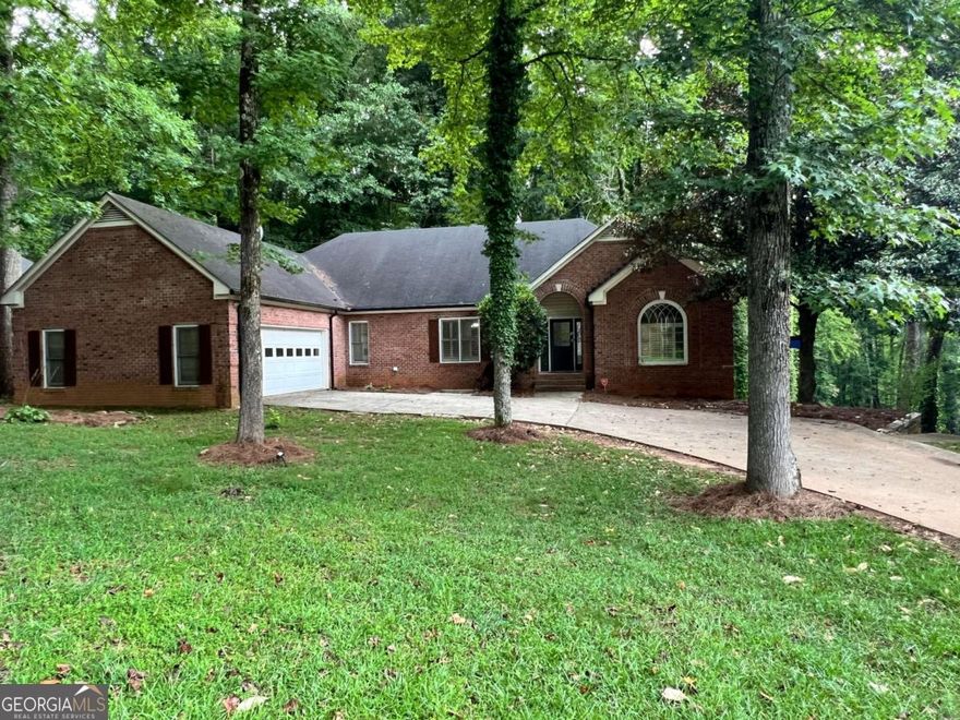 Step into spacious living in this beautiful 5-bedroom, 3.5-bath home located in the sought-after Hamptons Grant Subdivision. The main level features a primary suite with a private bath, a fireside family room, a separate Living Room, a separate dining room, and a kitchen with plenty of room for a breakfast nook-ideal for gatherings and everyday living.  The finished basement offers incredible versatility with its own entrance, kitchen, laundry area, bedroom, bathroom, and bonus room that can be used as a second living area or additional bedroom-perfect for guests, in-laws, or a recreation space.  Home is situated on a quiet cul-de-sac. Located within the award-winning Forsyth County School District and close to great shopping, dining, and parks, this home combines comfort, convenience, and community all in one.