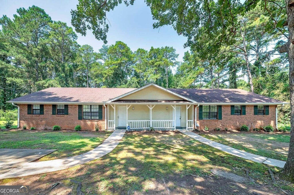 Photo of 355 Santa Fe Trail, Ellenwood, GA 30294 (MLS # 10874712)