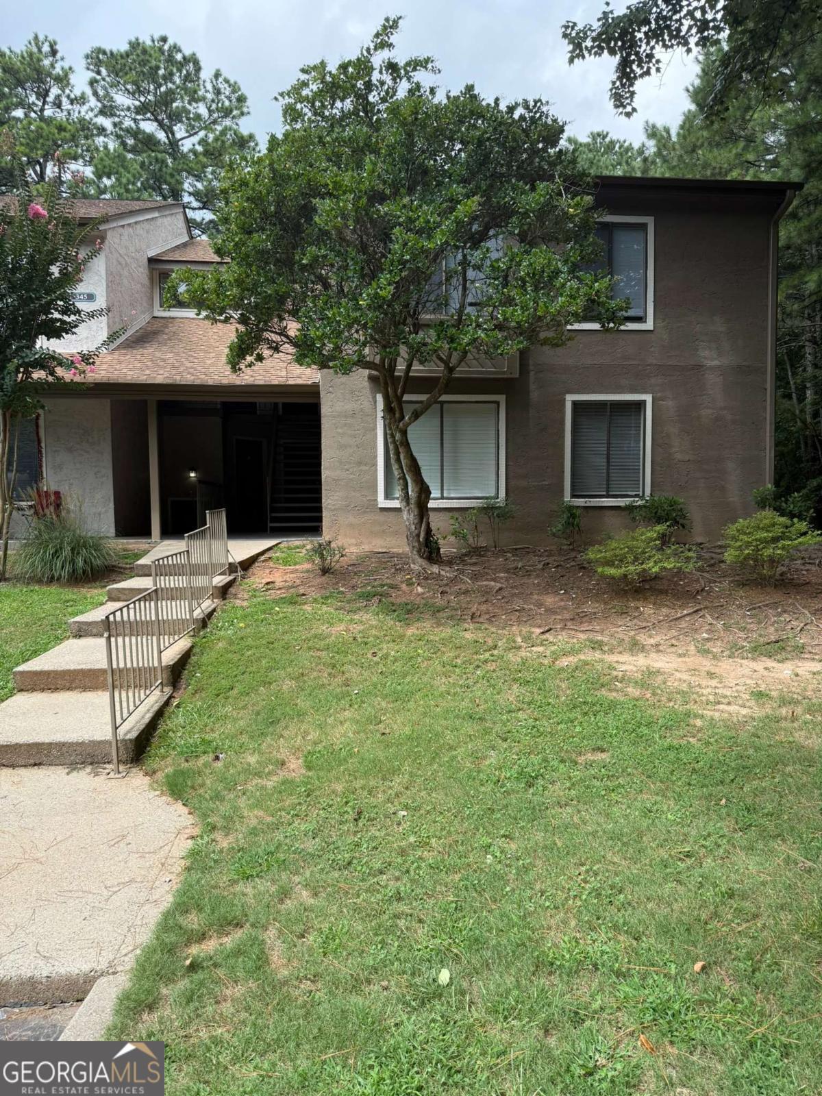 Location, Location, Location! This beautifully updated end-unit condo offers main-level living at its finest. Featuring 3 spacious bedrooms and 2 full bathrooms, each room is filled with natural light thanks to large, bright windows. The kitchen and bathrooms have been tastefully updated, blending modern style with everyday functionality. Step out onto the screened-in sunporch-a perfect spot to relax and unwind while overlooking a peaceful, wooded area. Don't miss this rare opportunity for comfort, convenience, and serene surroundings-all in one!